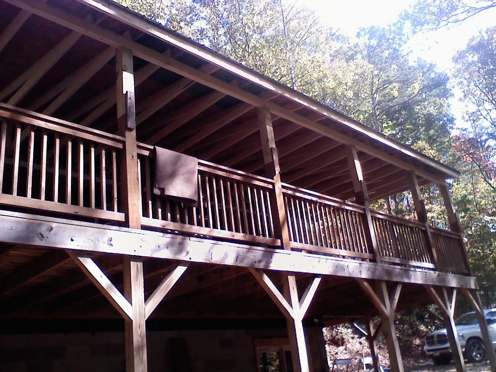 Timber framing under a new elevated porch and deck — Roof Leak Repair in Hannibal by Roofing Brothers
